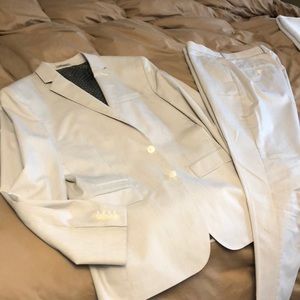 Express photograph light grey suit. worn 2 times